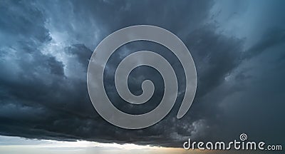 Dramatic rainy storm sky with dark fluffy clouds. Abstract nature background Stock Photo