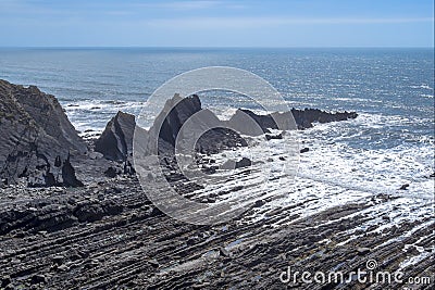 The dramatic, rugged coastline at Hartland Quay, north Devon. Facing south. Stock Photo