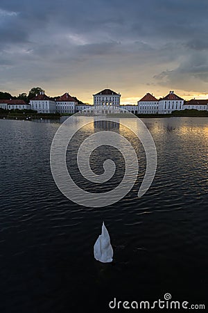 Dramatic scenery of post storm sunset of Nymphenburg palace in Munich Germany. Stock Photo