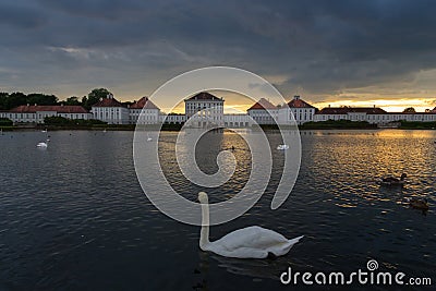 Dramatic scenery of post storm sunset of Nymphenburg palace in Munich Germany. Stock Photo