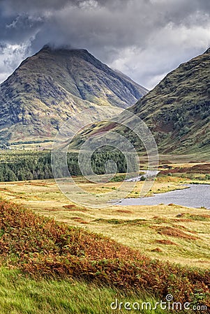 Dramatic skies over Lochan Urr and the river Etive. Stock Photo