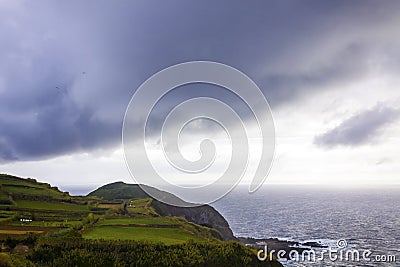 Dramatic sky over Atlantic Ocean coast near Sao Miguel Island, Azores, Portugal Stock Photo