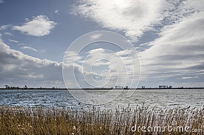 Dramatic sky over Haringvliet estuary Stock Photo