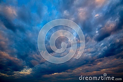 Dramatic sky with stormy clouds in sunset Stock Photo