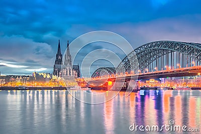 Dramatic skyline by Rhine River in Cologne, Germany Stock Photo