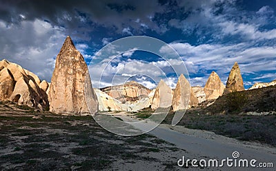 Dramatic spring scene in Cappadocia. Unreal world of Cappadocia, Red Rose valley in April. Cavusin village located, district of N Stock Photo