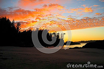 Dramatic Pacific Sunset over Remote Beach on Flores Island, Clayoquot Sound, British Columbia, Canada Stock Photo