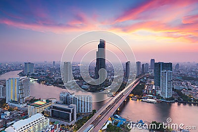 Dramatic after sunset sky, aerial view Bangkok city river curved Stock Photo