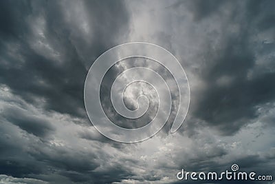 Dramatic thunder storm clouds at dark sky Stock Photo