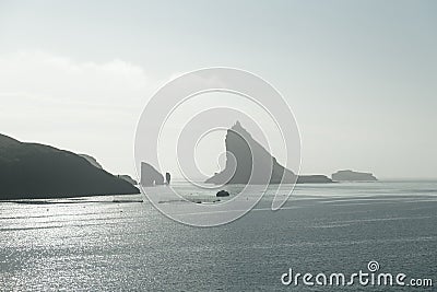 Dramatic view on Drangarnir and Tindholmur sea stacks Stock Photo