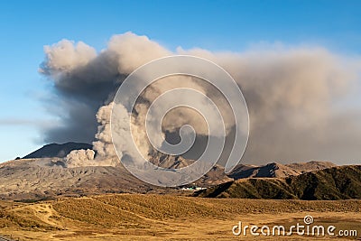 Dramatic view Mount Aso largest active volcano in Japan - 1592m. venting ashes before explosion. Stock Photo