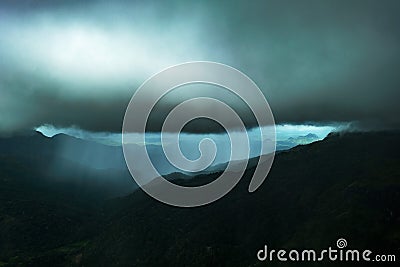 Dramatic view in the mountains during heavy rain. Stock Photo