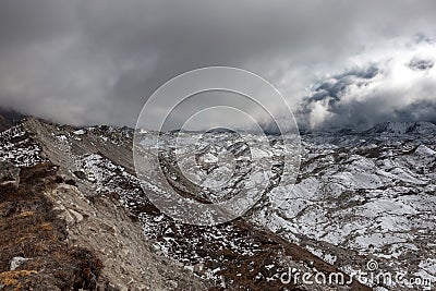 Dramatic view over gloomy Ngozumpa glacier in. Stock Photo