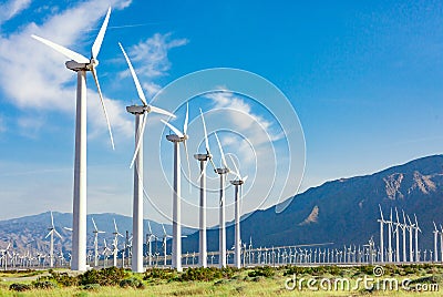 Dramatic Wind Turbine Farm in the Deserts of California. Stock Photo