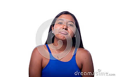 Dramatic woman making a sad face. Black woman acting sad. Black skinned latin girl showing sadness with her lips Stock Photo