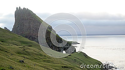 Drangarnir Sea Stack Peaks rising out of the atlantic ocean on the Faroe Islands. Stock Photo