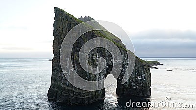 Drangarnir Sea Stack Rock in the Atlantic ocean on VÃ¡gar Island, Faroe Islands. Stock Photo