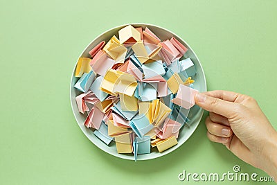 Draw lots. Folded colorful papers Stock Photo