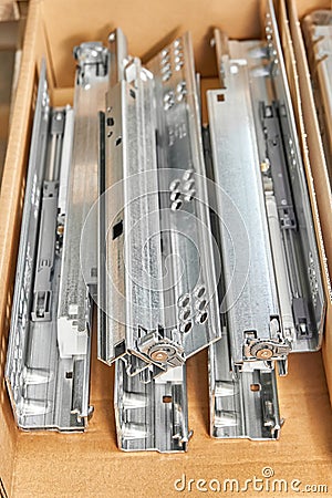 Drawer system slide folded into a cardboard box closeup Stock Photo