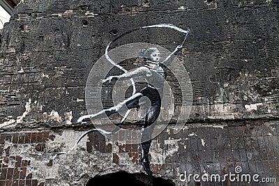 Drawing by Banksy on the wall of a house in Irpin, Ukraine Editorial Stock Photo