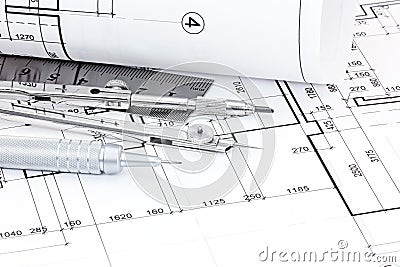 Drawing compass, ruler, pen and graphical architectural plans Stock Photo