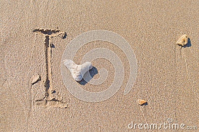 Drawing a heart on the beach Stock Photo