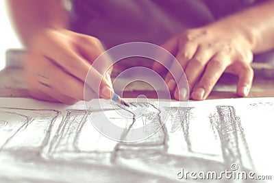 Drawing human figure with a pencil, blurred movement. Stock Photo