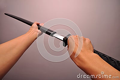 Drawing A Sword Stock Photo