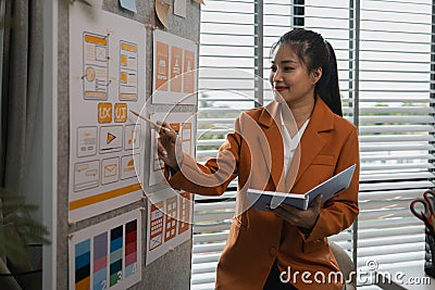 drawing website ux ui app for mobile phone application and development template layout, UI development, designer team working on a Stock Photo