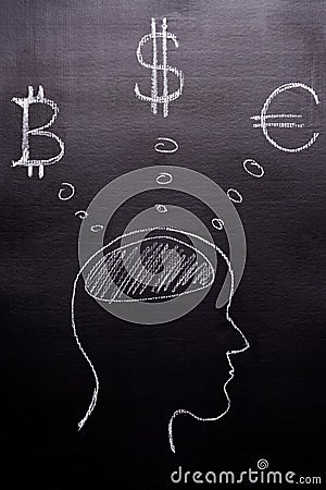 Drawn with chalk on a black background - the man`s head with thoughts of world currencies, Bitcoin, Dollar, Euro. The concept of Stock Photo