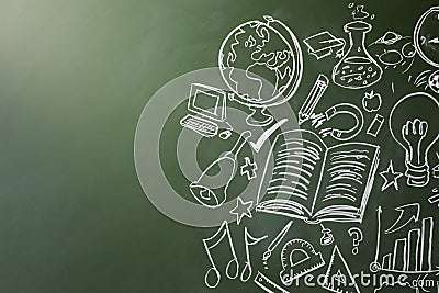 Drawn symbols of school subjects on a chalkboard, copy space Stock Photo