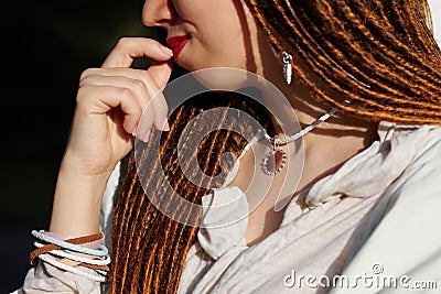 Dreadlocks fashionable girl face closeup Stock Photo