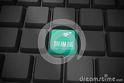 Dream big on black keyboard with green key Stock Photo