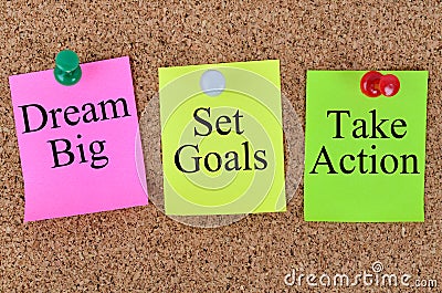 Dream big Set goals Take action written on notes Stock Photo