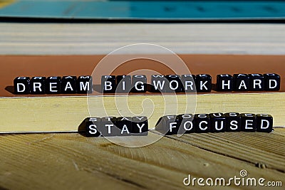 Dream big work hard stay focused on wooden blocks. Motivation and inspiration concept Stock Photo