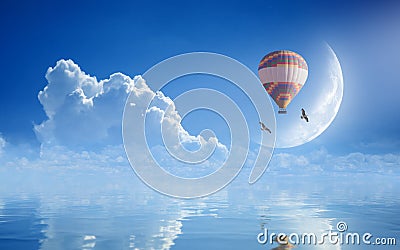 Dream come true concept - hot air balloon in blue sky Stock Photo