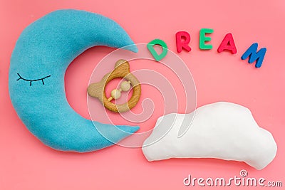 Dream copy for baby pattern with moon pillow, cloud, toy on pink background top view Stock Photo