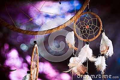 Dreamcatcher against a background of purple sunset dark Stock Photo