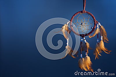 Dreamcatcher on a color background Stock Photo