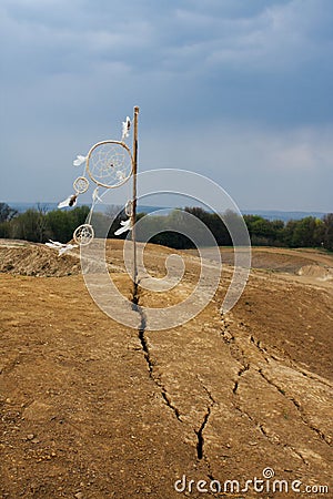 Dreamcatcher hanging in a dry land Stock Photo