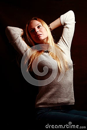 Dreaming blondy. Luxury woman with long blonde, red hair. Fashion Model. Stock Photo