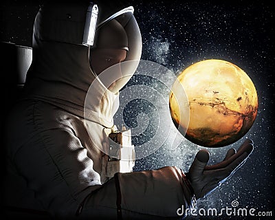 Dreaming of Mars. Astronaut reaching for the red planet of Mars. Exploration and journey to Mars concept. 3d rendering Stock Photo