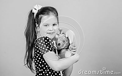 Dreaming of pet. small girl with soft bear toy. child psychology little girl playing game in playroom. happy childhood Stock Photo