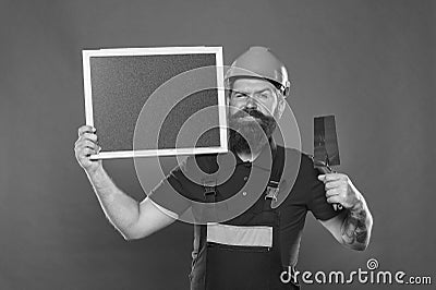 Dreams come true. Skillful plasterer. Successful renovation. Bearded man worker with plastering tool. Plasterer hipster Stock Photo