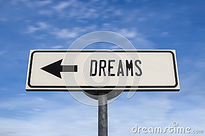 Dreams road sign, arrow on blue sky background Stock Photo