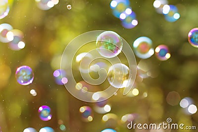 The Dreamy Abstract background from soap bubble in the air with Stock Photo