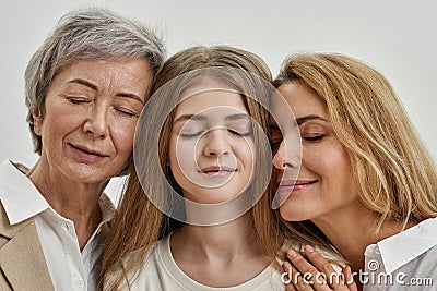 Dreamy caucasian three females with closed eyes Stock Photo
