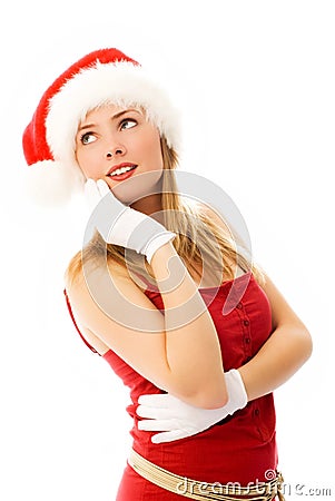 Dreamy girl wearing Santa's hat Stock Photo