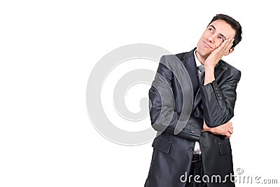 Dreamy man in formal suit touching face Stock Photo