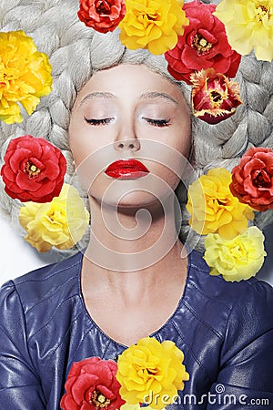 Dreamy Woman with Closed Eyes and Colorful Flowers Stock Photo